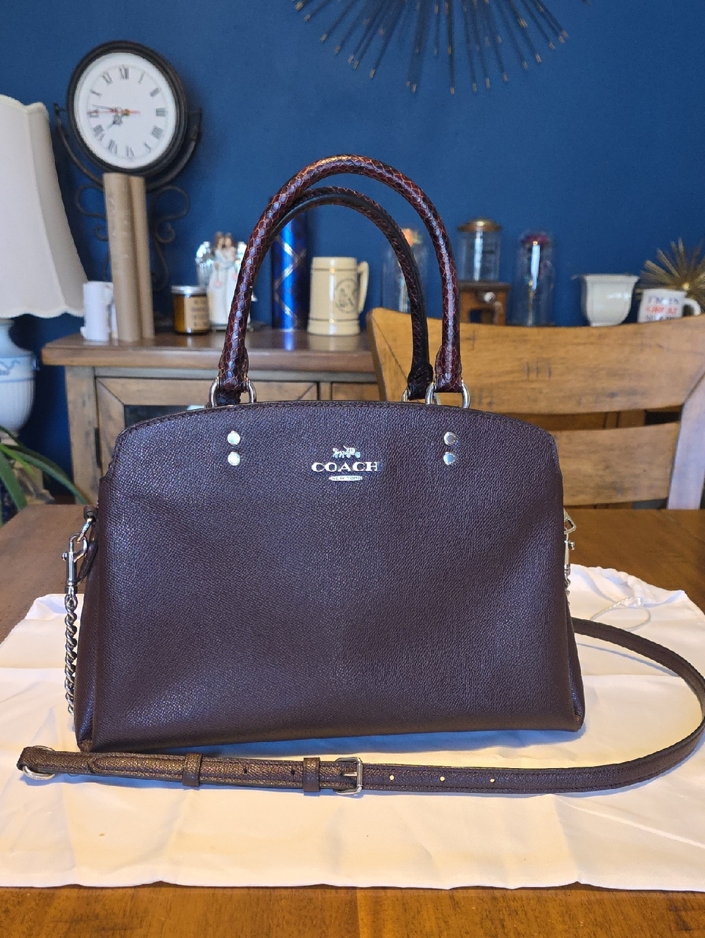 Coach Lillie Carryall in a deep burgundy with python-embossed